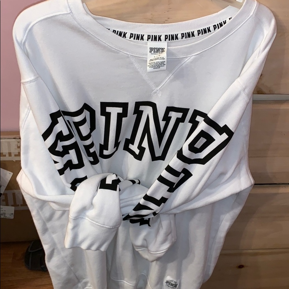 All white sweatshirt from PINK never worn !!
